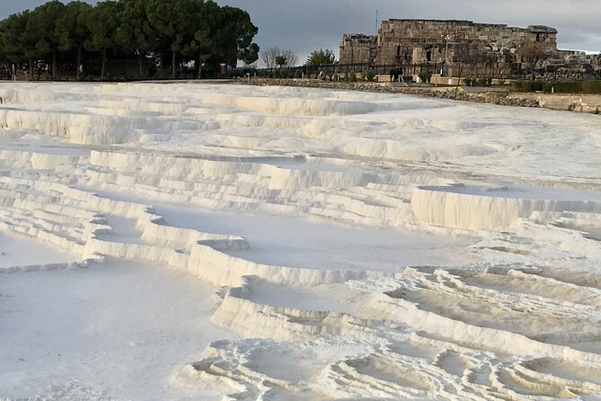 Full Day Pamukkale Terraces and Hierapolis Ruins Tour - Hierapolis ruins: Roman baths and the Necropolis on the same hill